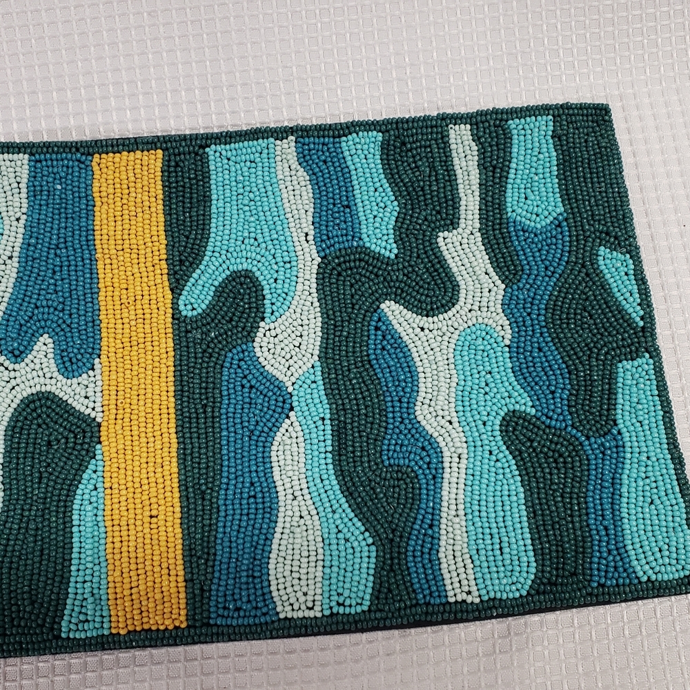 beaded clutch by Ink + Alloy